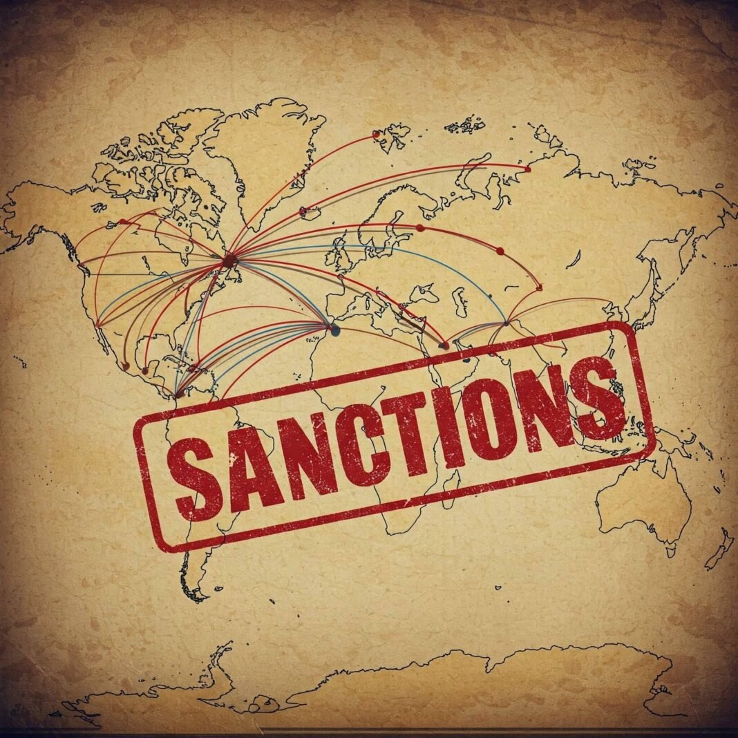 World map under Sanctions stamp